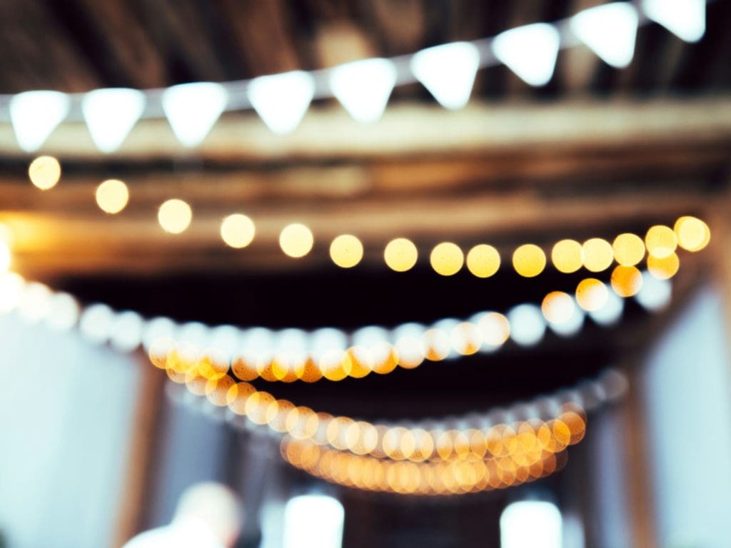 string lights across ceiling of event space