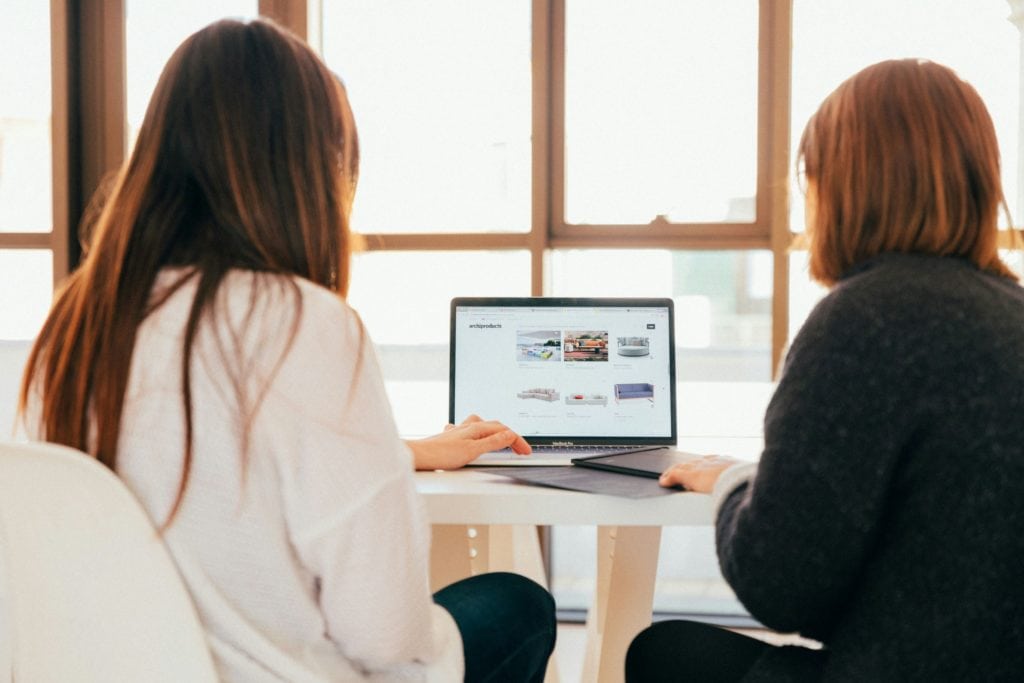 women discussing website