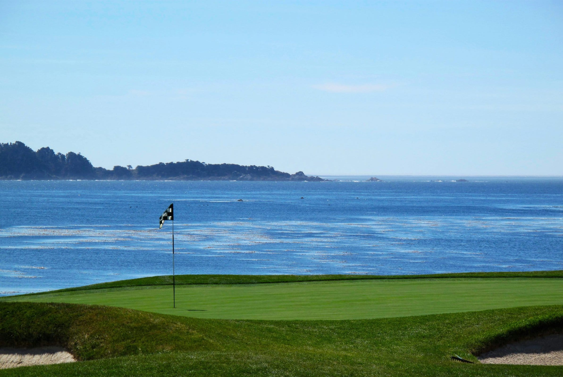 golf tee near water