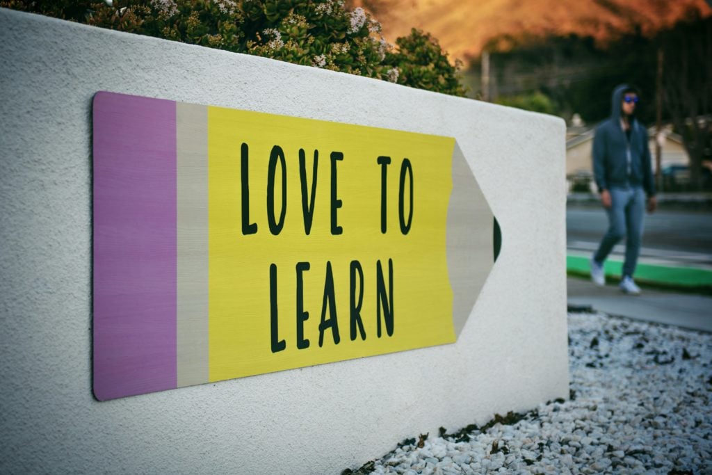 school sign that says "love to learn"