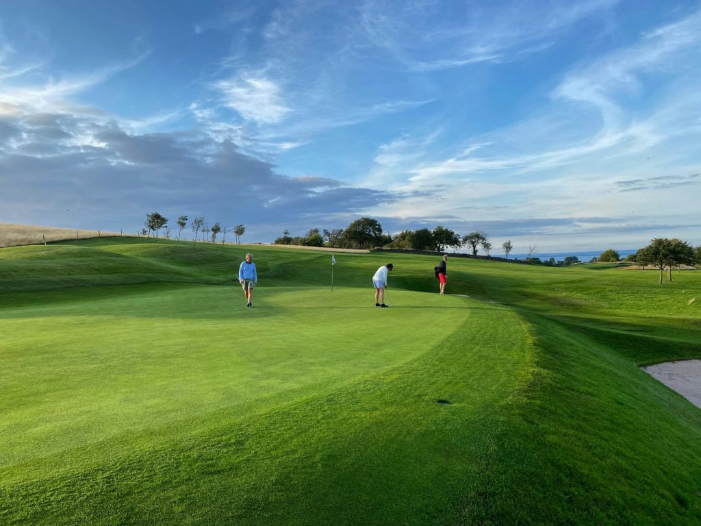 golfers on course