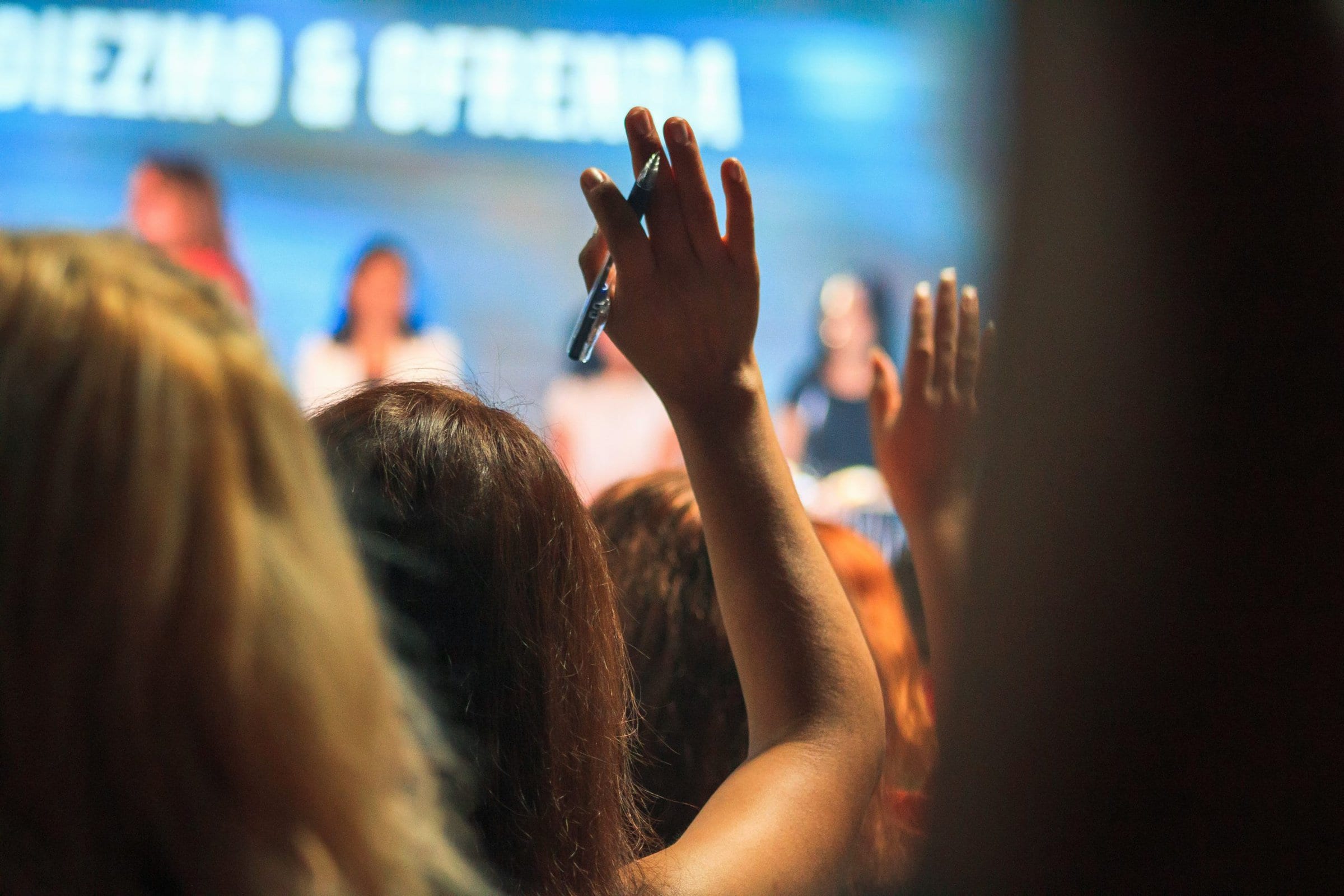 raised hands at event