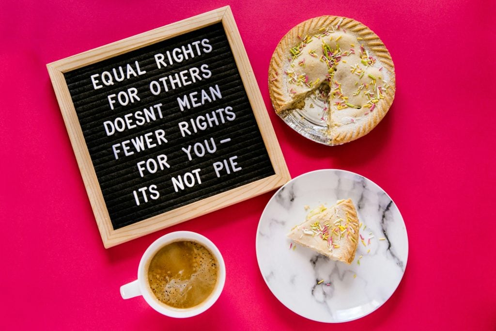 table with pie and coffee with sign that says "equal rights for others doesn't mean fewer rights for you - it's not pie"