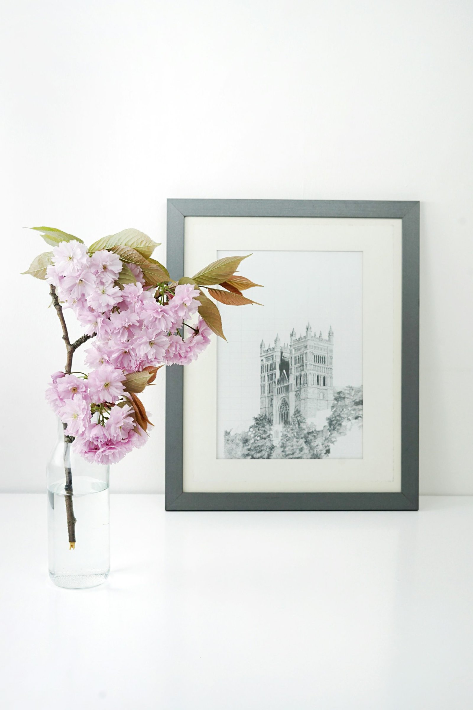 framed art and flowers